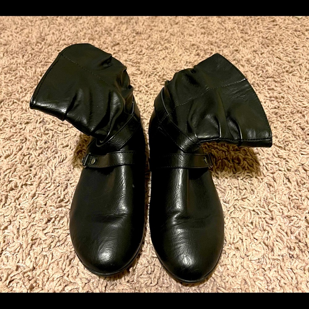Woman’s black boots